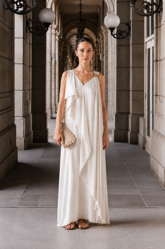 Ivory evening sleeveless draped dress with a golden trim